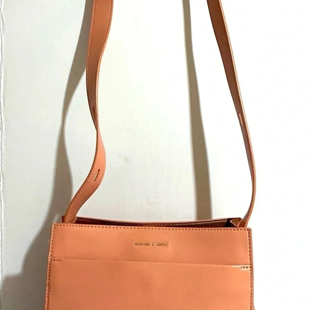 Charles & Keith pink poly crossbody handbag